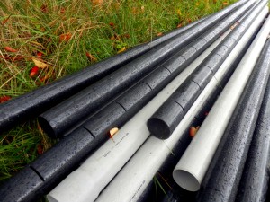 French drain systems utilize a perforated pipe and gravel water filter system.
